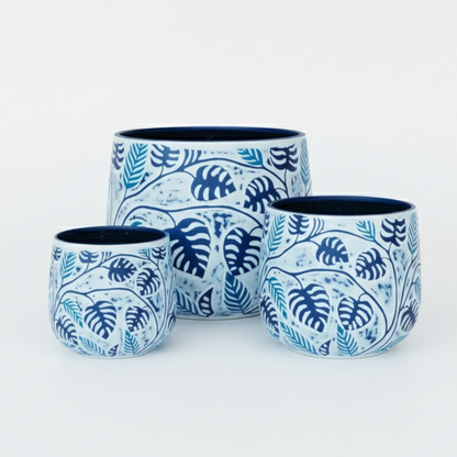Stylish Bunge Monstera Fibreglass Pot White with Blue Leaves